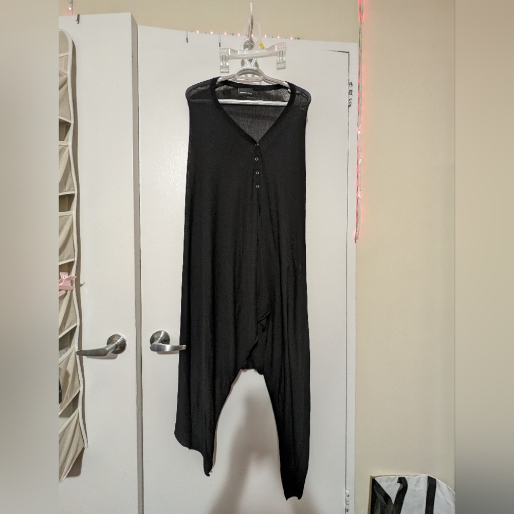 Black plus size knit poncho.  One size